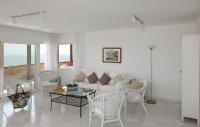 A seating area at Apartaments Beach & Golf Resort