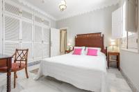 Postel nebo postele na pokoji v ubytování Casa Palacio San Jose