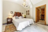 Postel nebo postele na pokoji v ubytování Casa Palacio San Jose