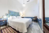Postel nebo postele na pokoji v ubytování Casa Palacio San Jose