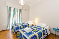 Posteľ alebo postele v izbe v ubytovaní Pisces - City Center Apartment