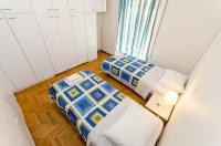 Posteľ alebo postele v izbe v ubytovaní Pisces - City Center Apartment