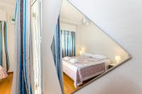 Posteľ alebo postele v izbe v ubytovaní Pisces - City Center Apartment