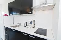 Kuchyň nebo kuchyňský kout v ubytování Rooms & Apartments Marinero