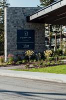 a sign on the side of a building at Entourage sur-le-Lac in Lac-Beauport