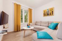 Telewizja i/lub zestaw kina domowego w obiekcie Grace Apartment I