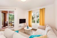 Telewizja i/lub zestaw kina domowego w obiekcie Grace Apartment I