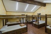 Postel nebo postele na pokoji v ubytování Albergue Villa de Bulnes
