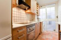 Kuchyň nebo kuchyňský kout v ubytování ApartEasy - Atic Sagrada Familia