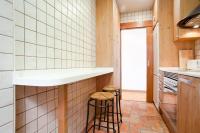 Kuchyň nebo kuchyňský kout v ubytování ApartEasy - Atic Sagrada Familia