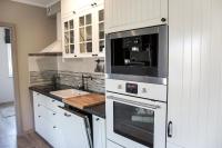 Kuchyňa alebo kuchynka v ubytovaní Apartamenty Cicha by Royal Aparts