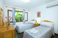 A bed or beds in a room at Owl Booking Villa March - 10 Min Walk to the Old Town