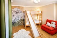 Postel nebo postele na pokoji v ubytování Familienhotel Hinteregger