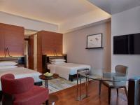 Grand Hyatt Manilaにあるベッド