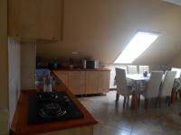A kitchen or kitchenette at Erika Vendégház