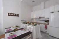Kuchyňa alebo kuchynka v ubytovaní Apartamentos Plaza Pilatos