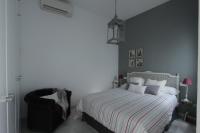 Posteľ alebo postele v izbe v ubytovaní Apartamentos Plaza Pilatos