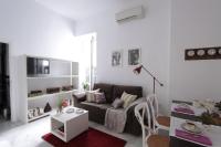 Posedenie v ubytovaní Apartamentos Plaza Pilatos