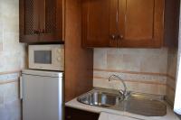 Kuchyň nebo kuchyňský kout v ubytování Apartamentos Rurales Parque