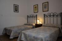 Postel nebo postele na pokoji v ubytování Apartamentos Rurales Parque