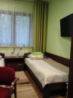 Posteľ alebo postele v izbe v ubytovaní Willa Olympia