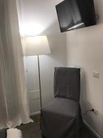 Televízia a/alebo spoločenská miestnosť v ubytovaní Salerno M'illumina