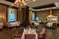 A restaurant or other place to eat at Elite World Van