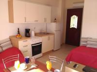 Kuchyňa alebo kuchynka v ubytovaní Mikros Gialos Apartments