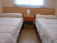 Posteľ alebo postele v izbe v ubytovaní Apartamentos Deluxe Pompeya 3