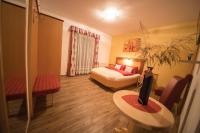 Łóżko lub łóżka w pokoju w obiekcie Hotel Garni Wolfgang