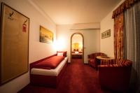 Łóżko lub łóżka w pokoju w obiekcie Hotel Garni Wolfgang