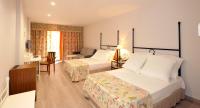 Postel nebo postele na pokoji v ubytování Hotel Salobreña Suites