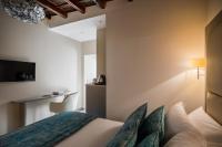 A television and/or entertainment centre at Reginella Suites