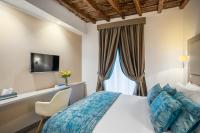 A bed or beds in a room at Reginella Suites
