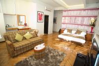 a living room with a couch and a table at ABode Manchester in Manchester
