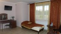 Łóżko lub łóżka w pokoju w obiekcie Hotel Irys