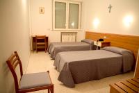 Postel nebo postele na pokoji v ubytování Casa Religiosa Di Ospitalità Nazareno