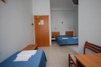 Postel nebo postele na pokoji v ubytování Casa Religiosa Di Ospitalità Nazareno
