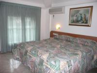 Postel nebo postele na pokoji v ubytování Hotel Darsena