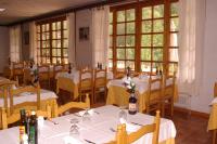 A restaurant or other place to eat at Hostal La Cabanya
