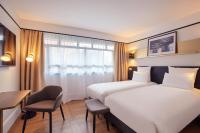 Ein Bett oder Betten in einem Zimmer der Unterkunft Mercure Paris Saint-Ouen