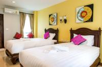 Postel nebo postele na pokoji v ubytování Villa Thai Orchid (adult only)