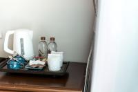 Příslušenství pro přípravu čaje a kávy v ubytování Villa Thai Orchid (adult only)