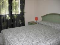 A bed or beds in a room at Green I