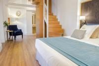 Postel nebo postele na pokoji v ubytování Halo Boutique Hotel