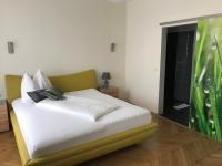 Postel nebo postele na pokoji v ubytování Hotel Bellini