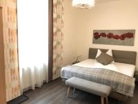 Postel nebo postele na pokoji v ubytování Hotel Bellini