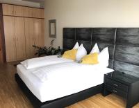 Postel nebo postele na pokoji v ubytování Hotel Bellini