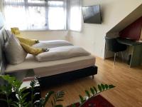 Postel nebo postele na pokoji v ubytování Hotel Bellini