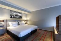 Ramada by Wyndham Amsterdam Airport Schipholにあるベッド